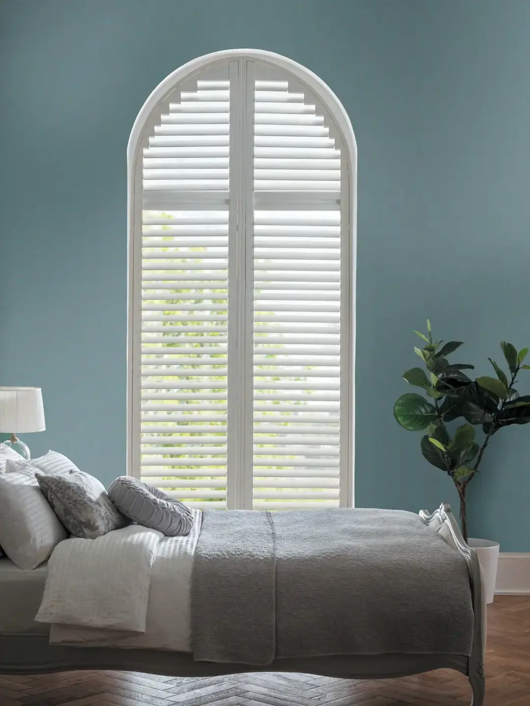 Shaped arched plantation shutters for bespoke window shapes