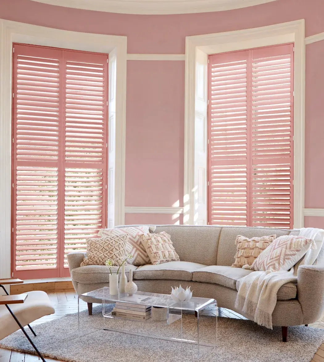 Custom colour plantation shutters fitted in a Caerphilly living room for privacy and light control